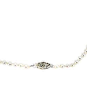 This is a stunning example of a classic Japanese akoya saltwater cultured pearl necklace.  The pearls are graduated and range from 3.00-7.00mm. They are round with excellent luster and sharp rosy overtones. The have almost no blemishes.  Clasp is in solid yellow gold and is a filigree design. It is stamped "14K".  Total length is 17.50 inches.  All pearls are truly vintage and have only been lightly cleaned and restrung.